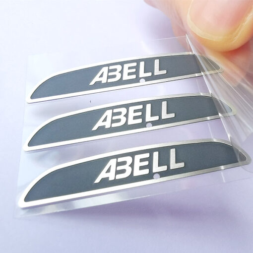 Edelstahl-Metallaufkleber 35 JTT-Logos | China Professionelle Hersteller von benutzerdefinierten metallischen Logoaufklebern, Fabrik